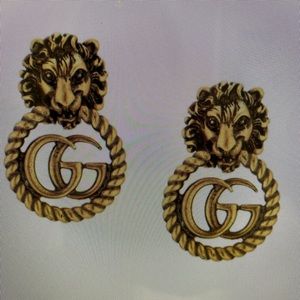Gucci lion earrings